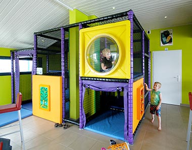 Play structure for children inside the snack bar of the campsite in Vendée
