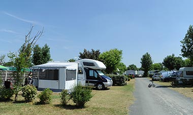 Motorhomes on a driveway at Les Écureuils campsite in Saint-Hilaire-de-Riez