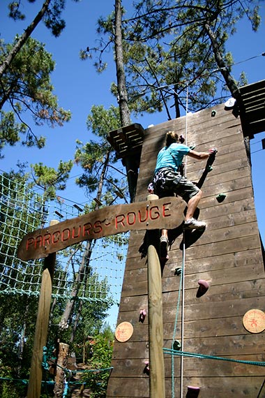 Climbing wall at the Feeling Forest tree climbing club near the campsite in Vendée