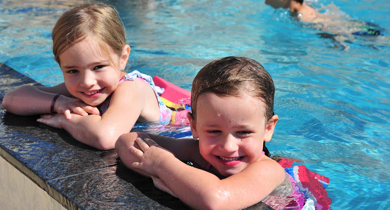 Little girls by the pool at the Vendée campsite in Saint-Hilaire-de-Riez